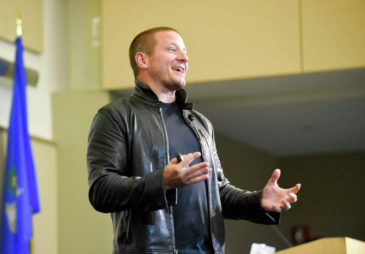 Shawn Nelson, founder and CEO of Lovesac, gives a speech in the UConn-Stamford Gen Re auditorium during the FastFWD conference on Sept. 27, 2019.