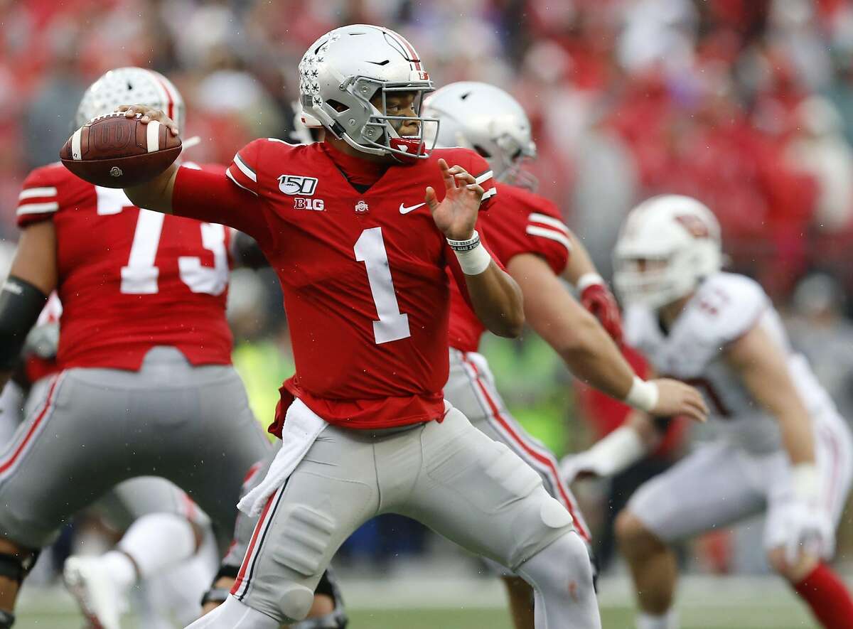 Justin Fields, Ohio State's quarterback, is expected to be a high draft pick. (Adam Cairns/Columbus Dispatch/TNS)
