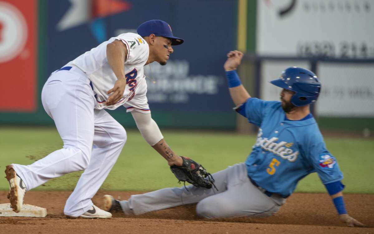 RockHounds' Edwin Diaz puts the tag on Amarillo's Pater Van Gansen as he tries to steal second Sept. 7, 2019 in game 4 of the Texas League Division playoff.
