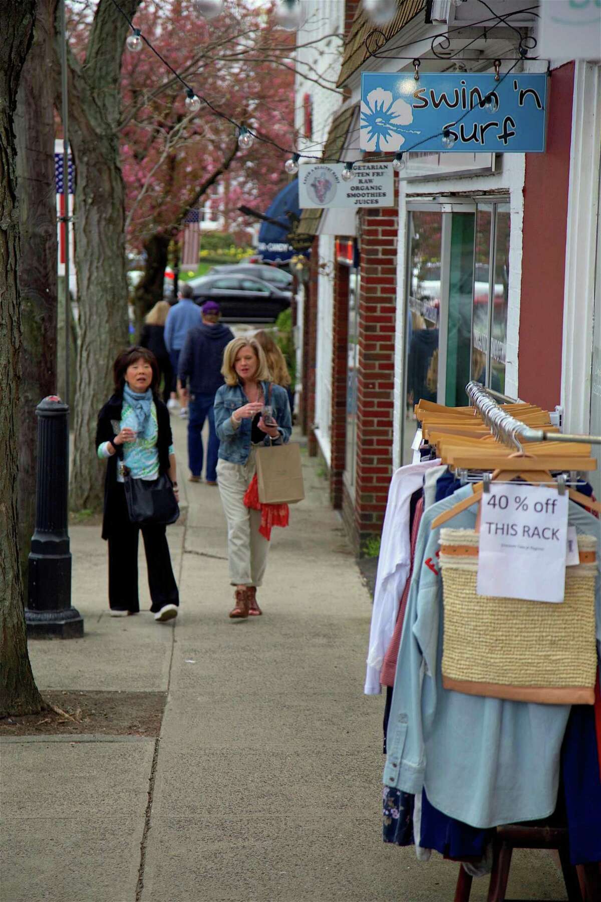 Discounts were in the offing, as in this shop along Unquowa Road, at the downtown Fairfield Shop & Stroll on Thursday, April 25, 2019, in Fairfield, Conn.