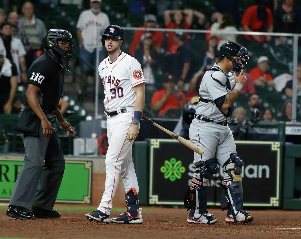 Houston Astros right fielder Kyle Tucker (30) reacts after striking out with the bases loaded to end the ninth inning of an MLB baseball game at Minute Maid Park, in Houston, Wednesday, April 14, 2021.