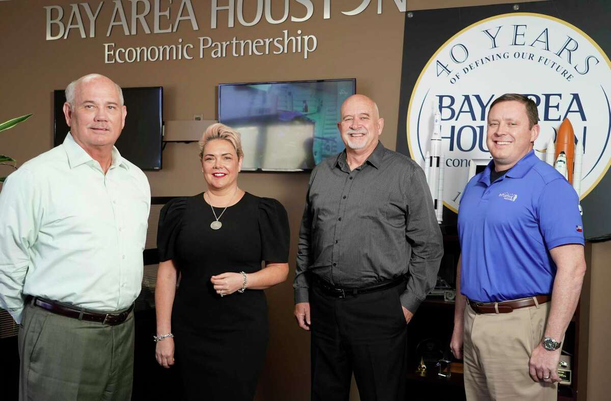 Bob Mitchell, president of the Bay Area Houston Economic Partnership, left, Brandy Obvintseva, founder of Gallant Culture, Kim Morris, aerospace marketing manager for the Bay Area Houston Economic Partnership, and former NASA astronaut Jack “2fish” Fischer, vice president of strategic programs for Intuitive Machines, right, are shown Monday, April 12, 2021 in Houston. They are some of key people in creating TexSpace, an organization that hopes to become a one-stop shop for growing the space sector in Houston and across the state.