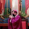 Bishop David Toups joins in an opening prayer as he leads an Ash Wednesday service at St. Anthony Cathedral Basilica. Photo made Wednesday, February 17, 2021 Kim Brent/The Enterprise