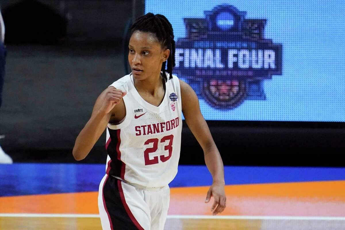 Stanford guard Kiana Williams (23) celebrates during the first half of the championship game against Arizona in the women's Final Four NCAA college basketball tournament, Sunday, April 4, 2021, at the Alamodome in San Antonio. (AP Photo/Eric Gay)