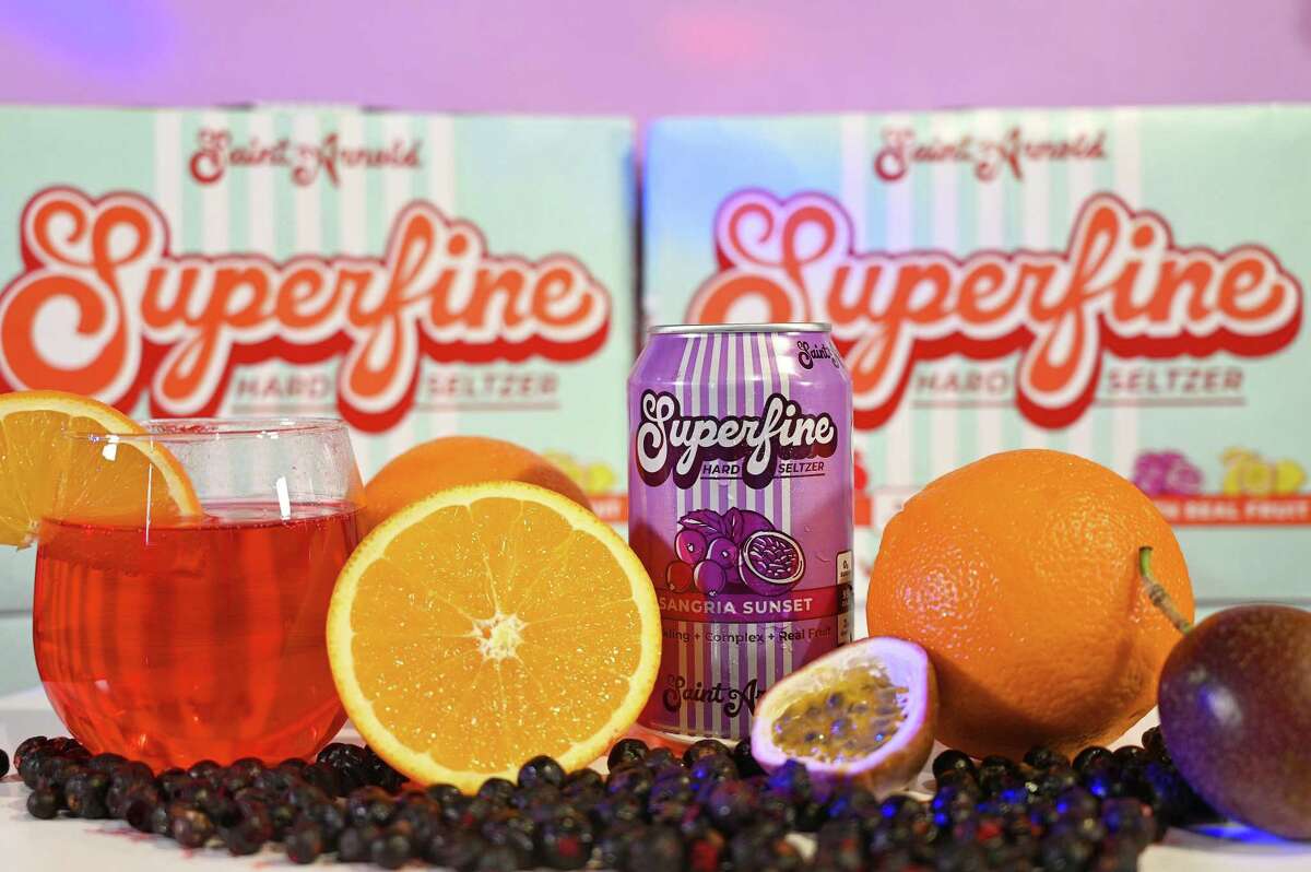 Saint Arnold Brewing's Superfine hard seltzer line includes Sangria Sunset, with black currant, passion fruit and orange peel.