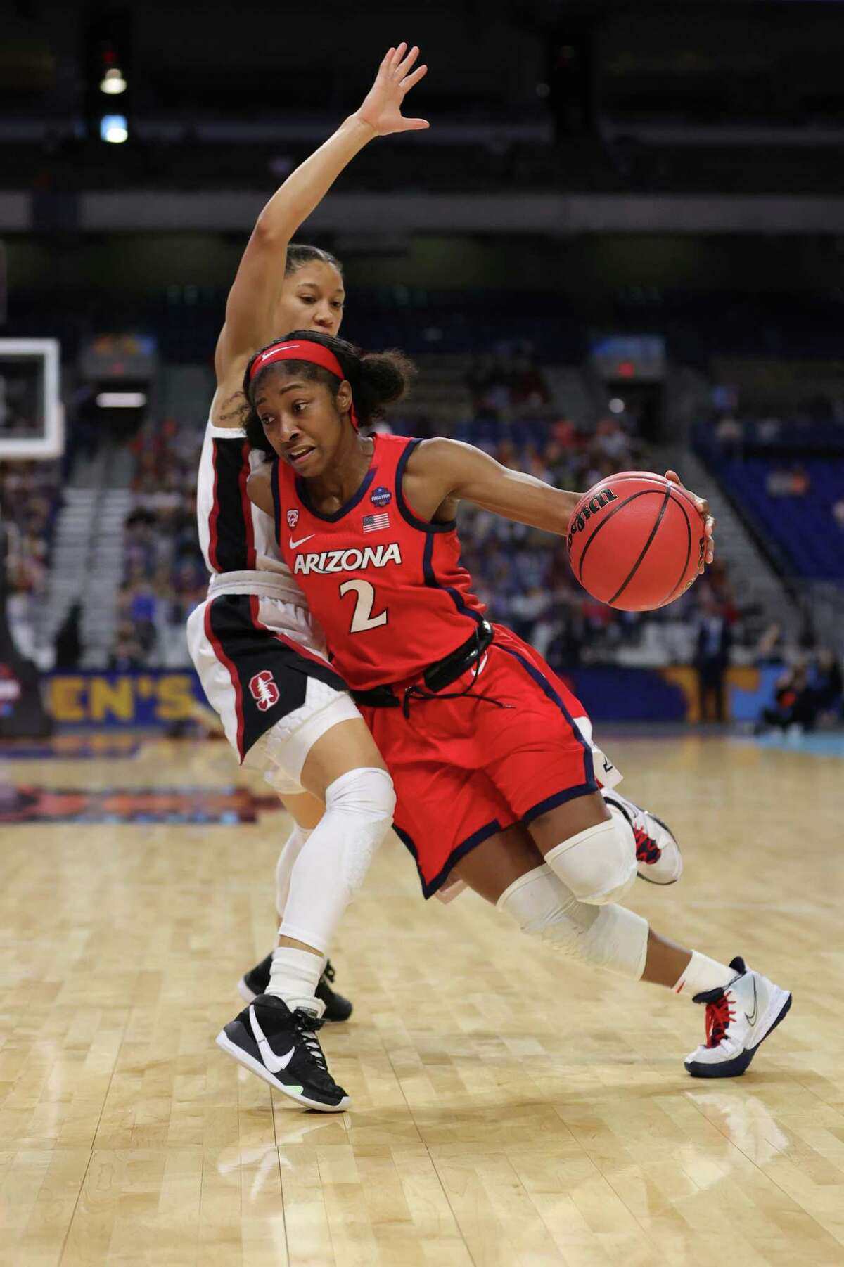 SAN ANTONIO, TEXAS - APRIL 04: Aari McDonald #2 of the Arizona Wildcats drives to the basket against the Stanford Cardinal in the National Championship game of the 2021 NCAA Women's Basketball Tournament at the Alamodome on April 04, 2021 in San Antonio, Texas. (Photo by Carmen Mandato/Getty Images)