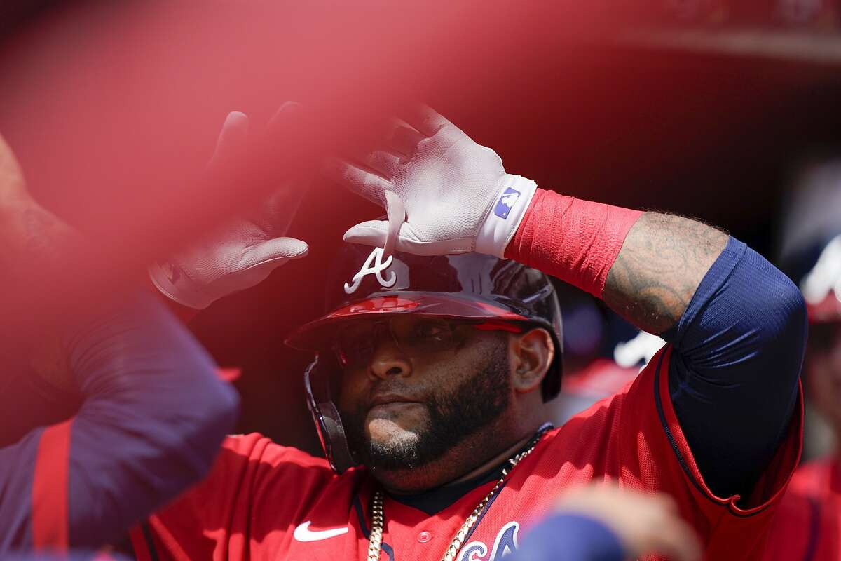 Atlanta Braves' Pablo Sandoval (48) celebrates after scoring a home run in the sixth inning of a baseball game against the Miami Marlins Thursday, April 15, 2021, in Atlanta. (AP Photo/Brynn Anderson)