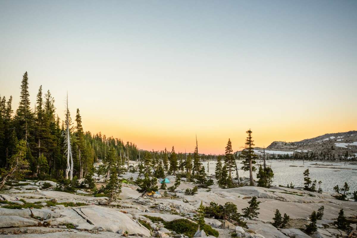 Backpackers settle in for sunset in Desolation Wilderness, near Lake Tahoe.