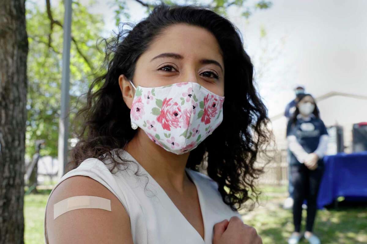 Harris Co. Judge Lina Hidalgo shows off her injecting site bandage after receiving her first dose of the Moderna vaccine at Pitner Pocket Park Thursday, Apr. 1, 2021 in Houston, TX.