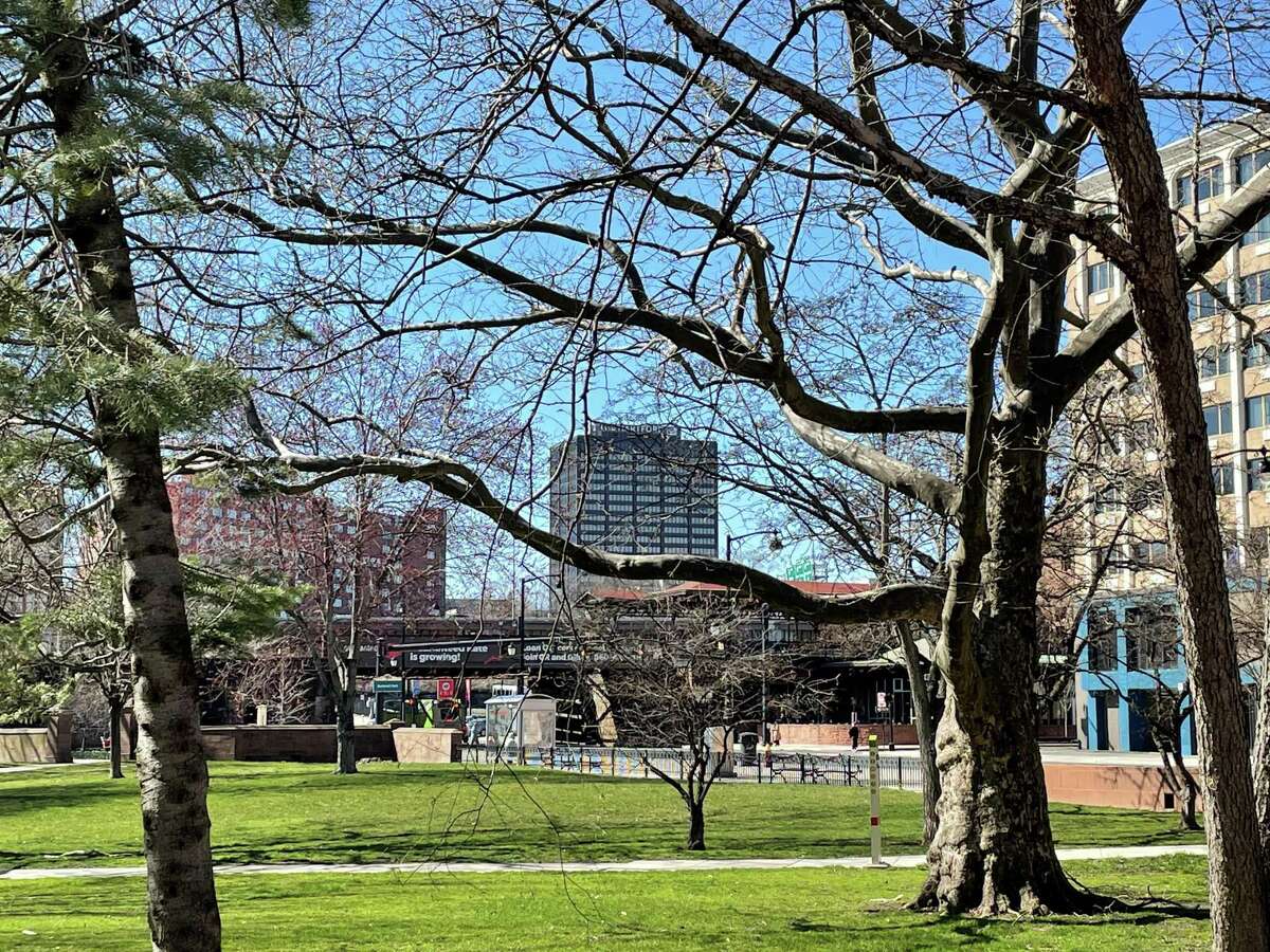 A view from Bushnell Park of The Hartford’s headquarters building at One Hartford Plaza, at center, in Hartford, Conn. The Hartford announced a $650 million settlement with the Boy Scouts of America on Friday, April 16, 2021.