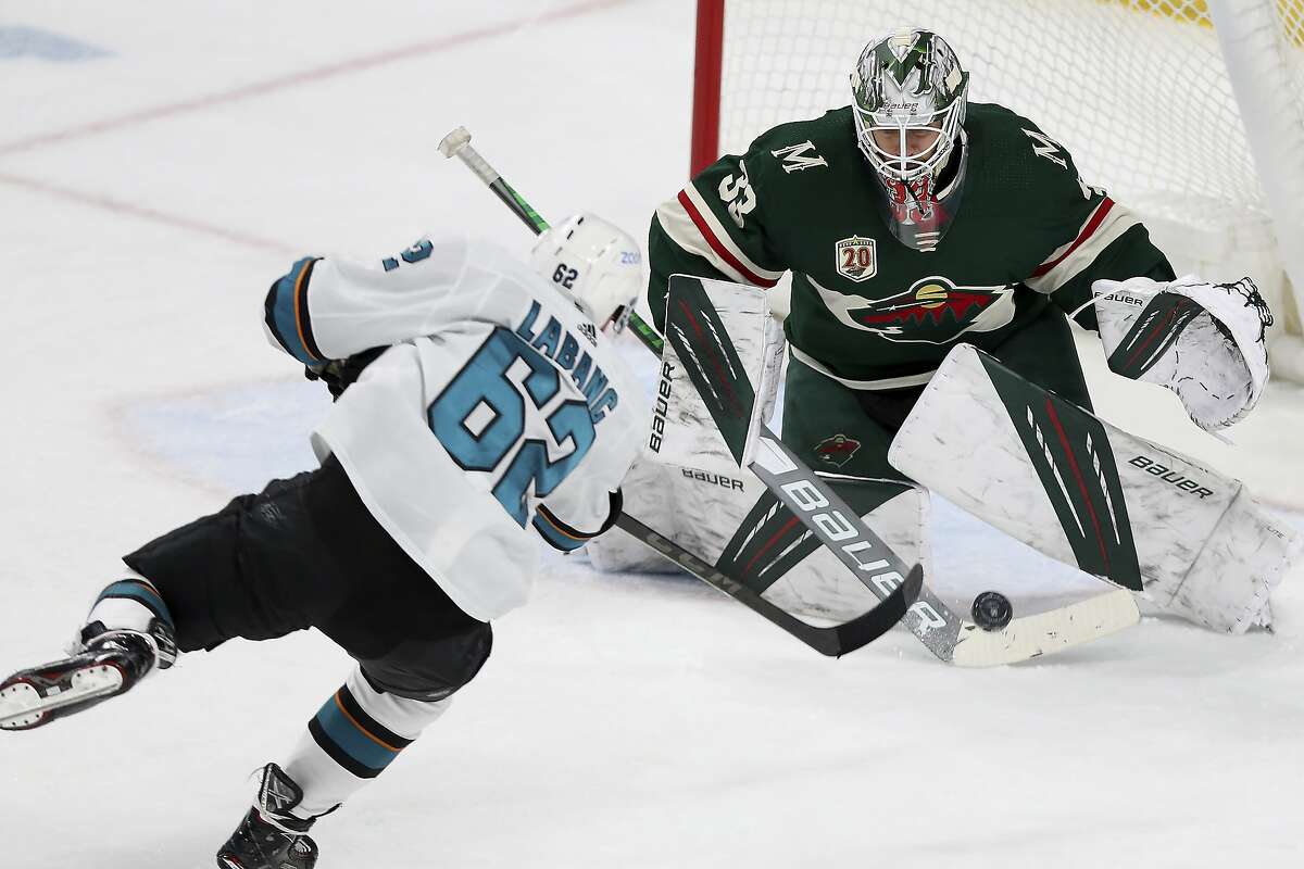 Minnesota goalie Cam Talbot turns aside a third-period shot by the Sharks’ Kevin Labanc. Talbot had 20 saves as the Wild dealt San Jose its fourth consecutive loss.