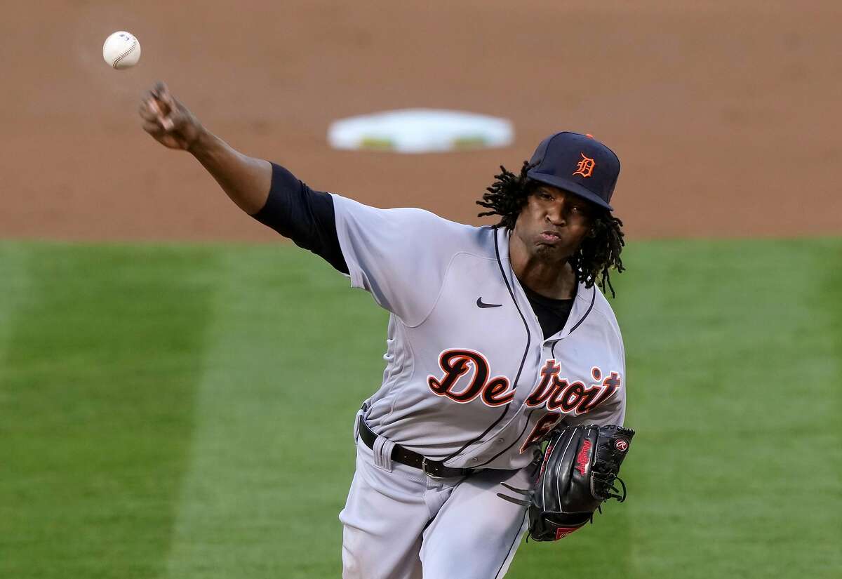 OAKLAND, CALIFORNIA - APRIL 16: Jose Urena #62 of the Detroit Tigers pitches against the Oakland Athletics in the first inning at RingCentral Coliseum on April 16, 2021 in Oakland, California. (Photo by Thearon W. Henderson/Getty Images)