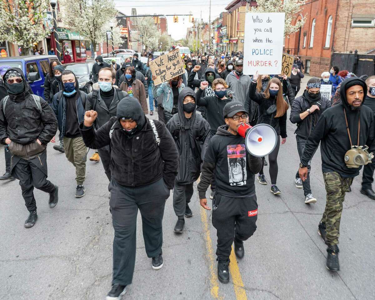 Black Lives Matter protesters walk through the streets of Albany, NY, to the South Station on Arch Street on Saturday, April 17, 2021. The march and protest were over the city’s use of tear gas and other protocol used against people of color (Jim Franco/Special to the Times Union)