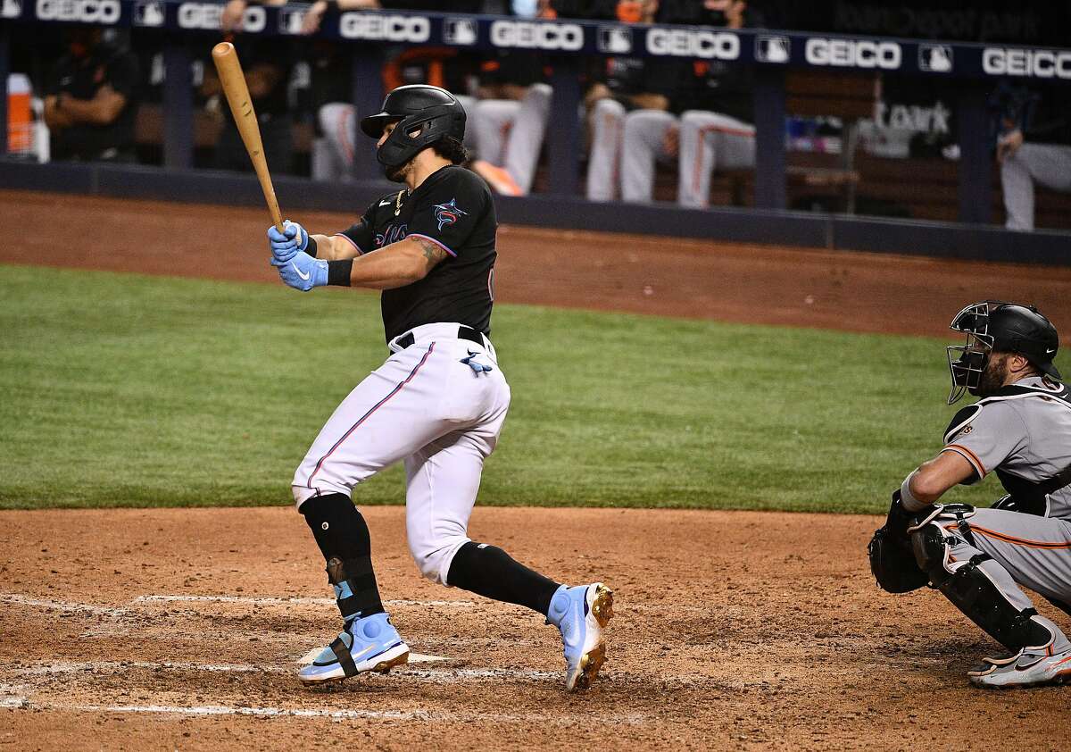 MIAMI, FLORIDA - APRIL 17: Jorge Alfaro #38 of the Miami Marlins hits a walk off single for two rbi's to defeat the San Francisco Giants In the tenth inning at loanDepot park on April 17, 2021 in Miami, Florida. (Photo by Mark Brown/Getty Images)