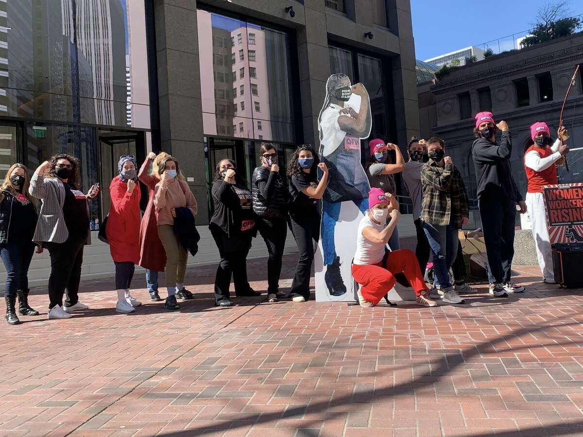 Women in the service industry hold a self-defense training and rally outside Sen. Feinstein’s office in downtown San Francisco in March of 2021, calling for the passage of the 'Raise the Wage' act while highlighting circumstances restaurant workers face as tipped employees.