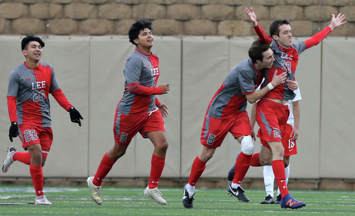 SA Lee’s Henry Bowland (23) celebrates with teammates after scoring a goal against Rockwall-Heath during their UIL 6A boys State championship soccer game at Birkelbach Field on April 17, 2021 in Georgetown, Texas.