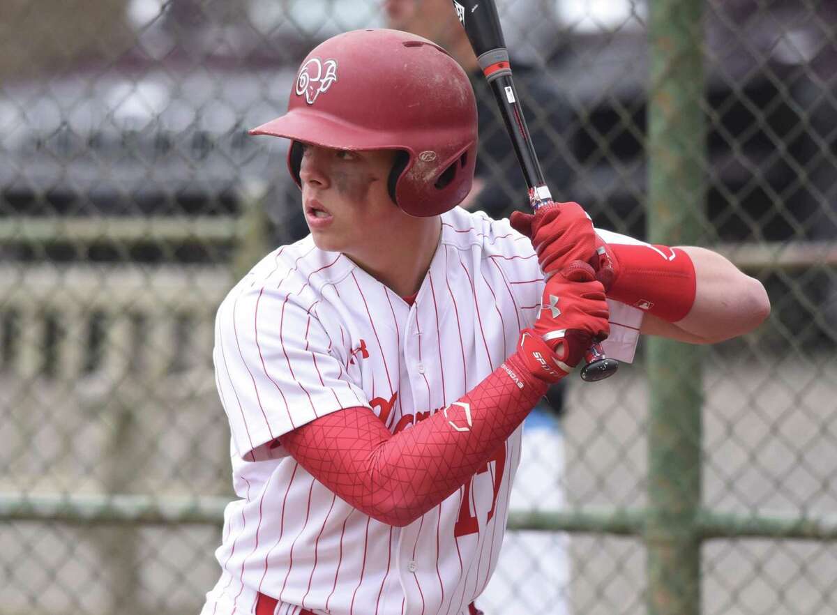 New Canaan's Henry Cannon awaits a pitch during a baseball game in Mead Park in 2019.