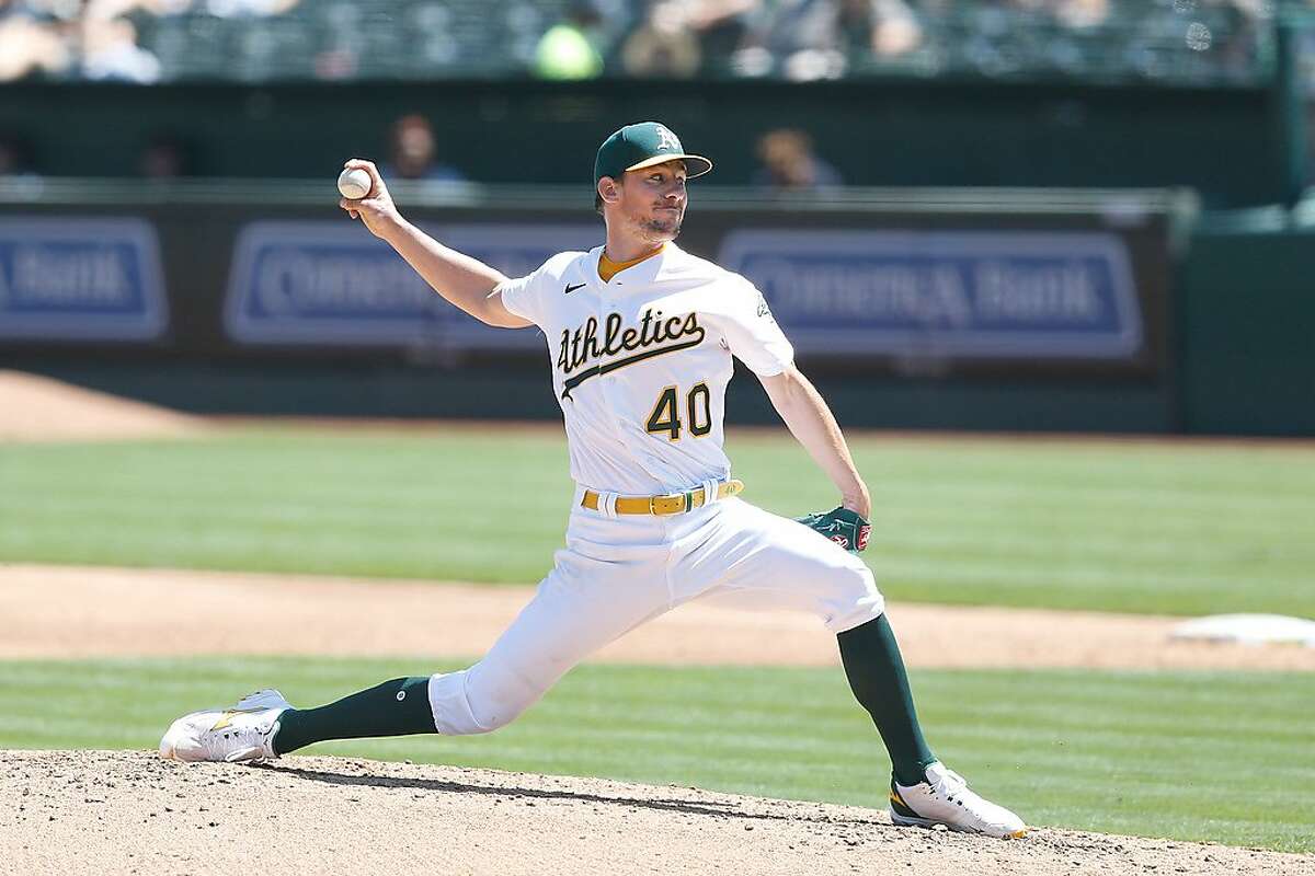 OAKLAND, CALIFORNIA - APRIL 18: Chris Bassitt #40 of the Oakland Athletics pitches in the top of the third inning against the Detroit Tigers at RingCentral Coliseum on April 18, 2021 in Oakland, California. (Photo by Lachlan Cunningham/Getty Images)