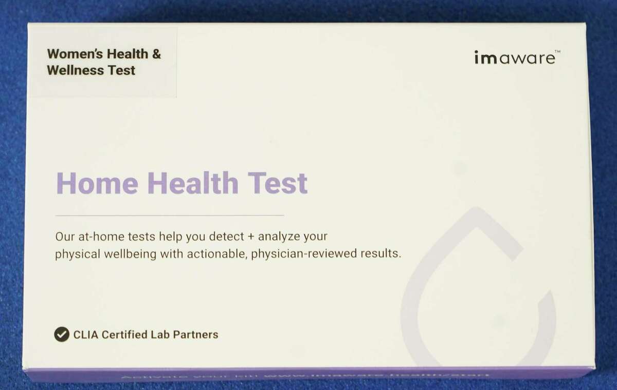 A home blood test kit from imaware is shown at CORE Health and Fitness, 8170 Spring Cypress Rd., owned by Missy Beasley, Friday, April 16, 2021 in Spring. This kit is a women's health and wellness test. She previously took an allergy at-home test.