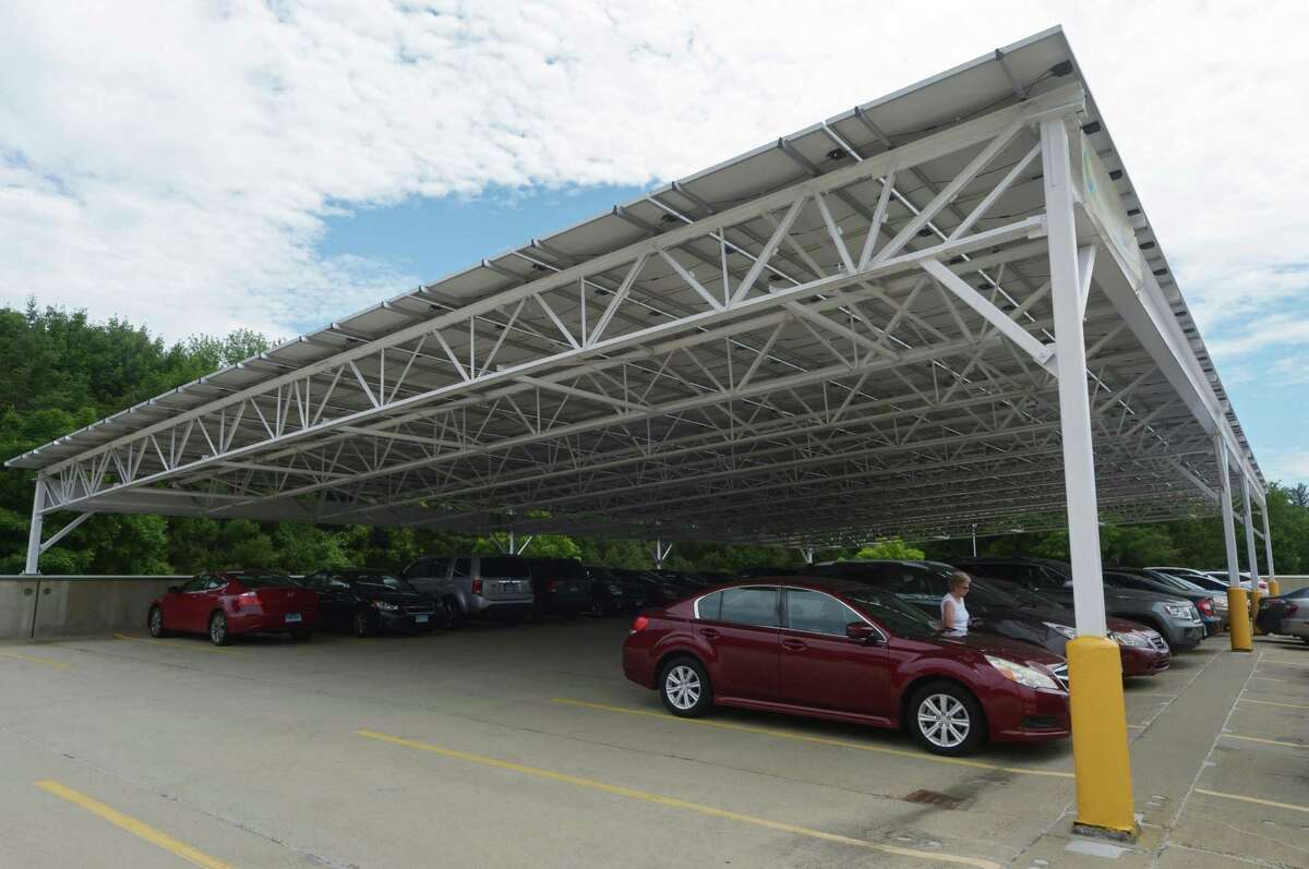 A solar array carport on the parking deck at Bowtie Royale 6 theater plaza at 542 Westport Ave. Wednesday, June 20, 2018, in Norwalk, Conn.