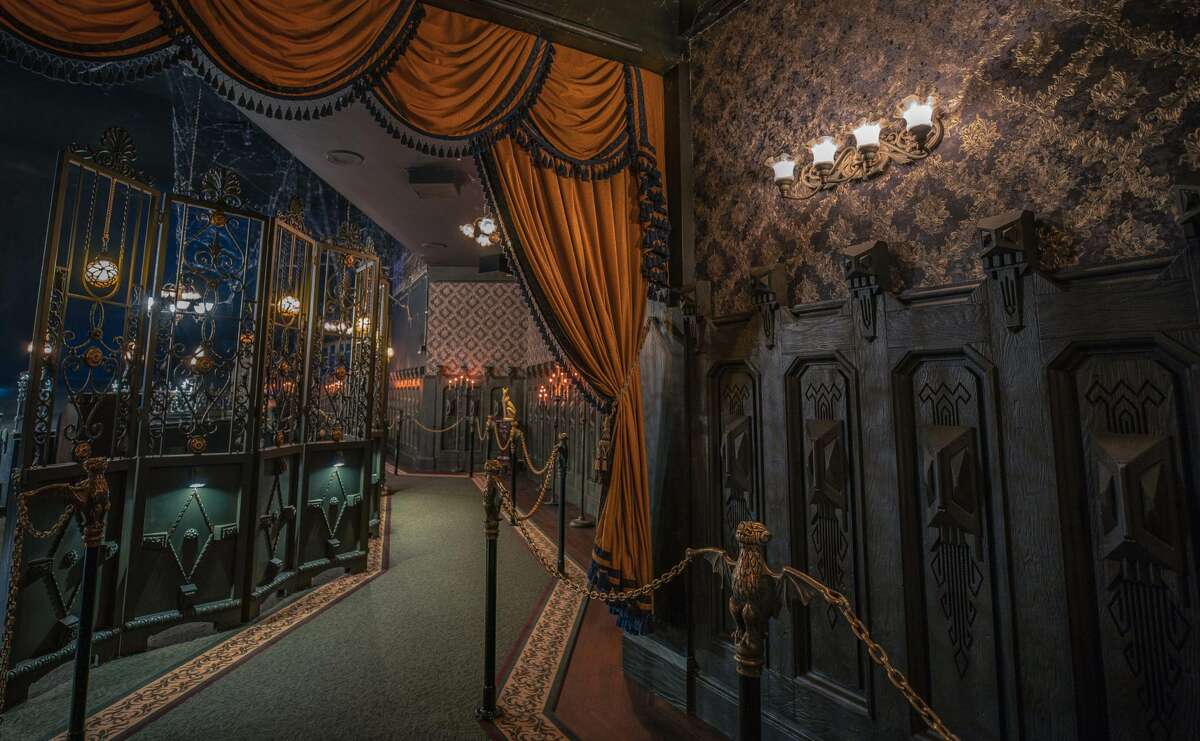 The Haunted Mansion in Disneyland Park has been updated with a few elements in and around the estate. Inside, a keen eye will notice a few dastardly design embellishments along the portrait hallway.