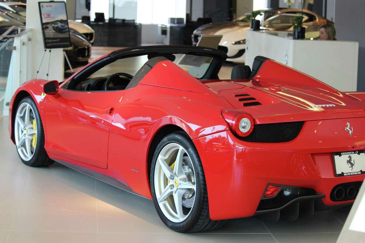 A 2014 Ferrari 458 Spider like this one was the subject of a lawsuit filed against a San Antonio dealership after an employee crashed the vehicle.