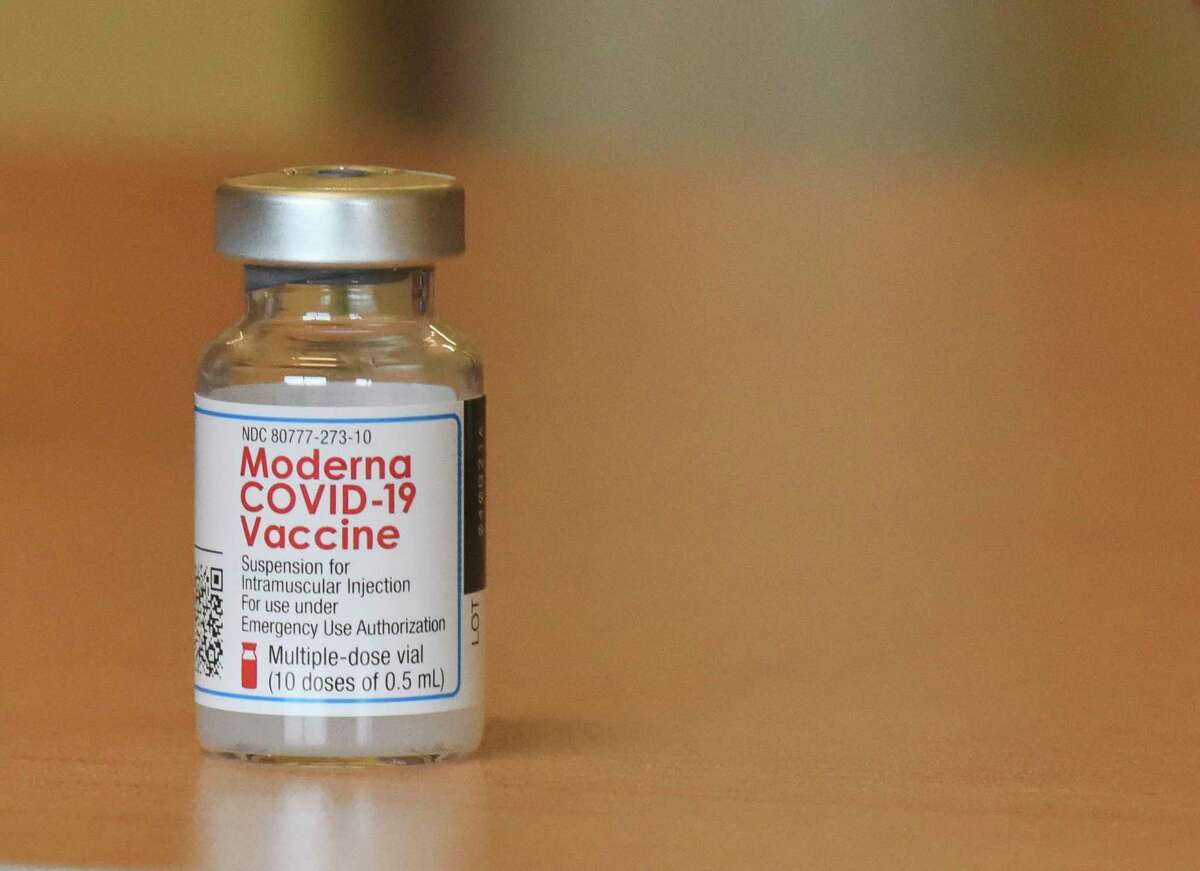 A vial of the Moderna COVID-19 vaccine is pictured at a clinic at InterCare Community Health Network, Friday, April 9, 2021, in Benton Harbor, Mich. (Don Campbell/The Herald-Palladium via AP)