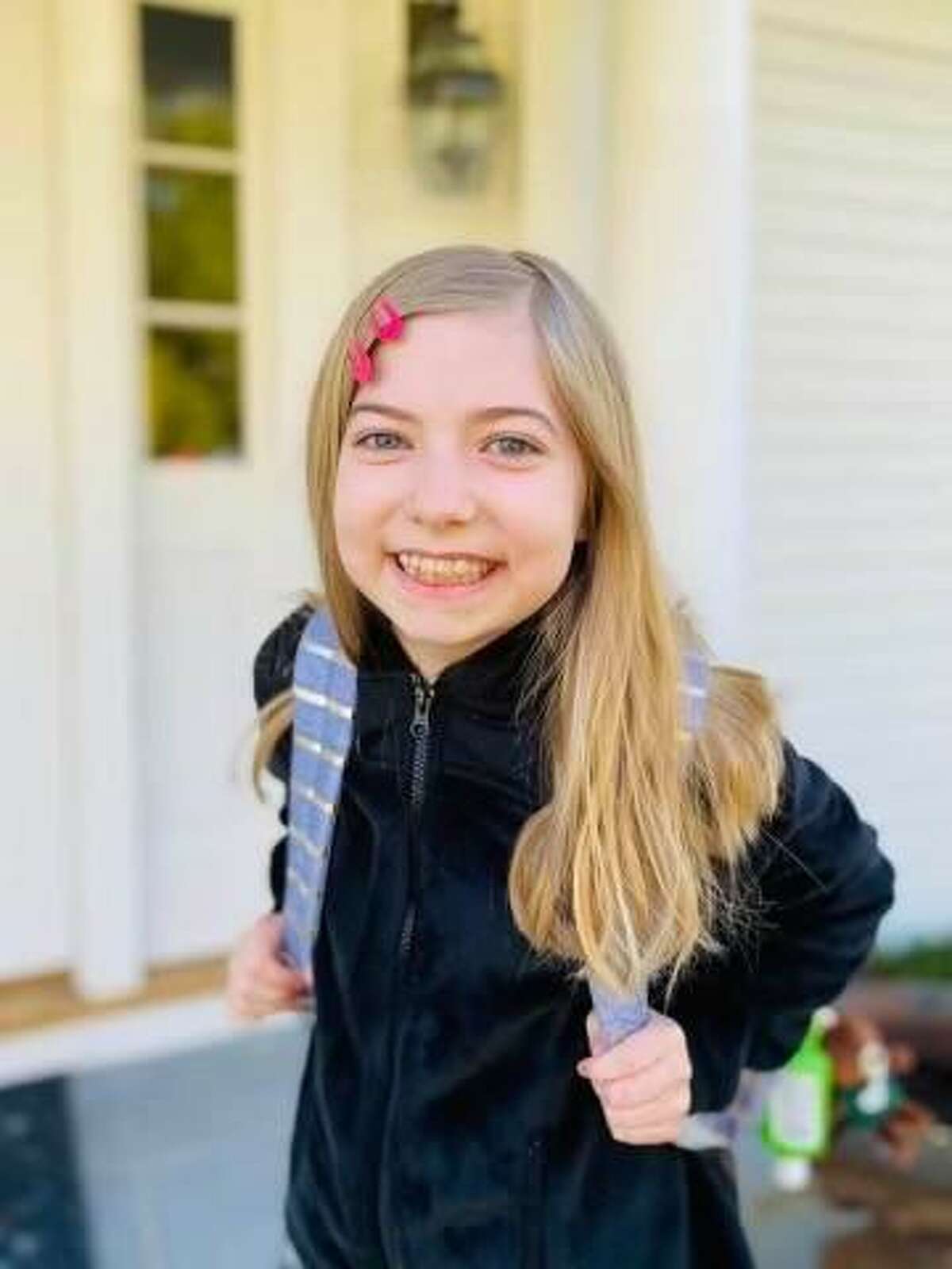 Ridgefield student Sofia Cluney was all smiles as she prepared to return to Branchville Elemenrary School in person for the first time since last year.