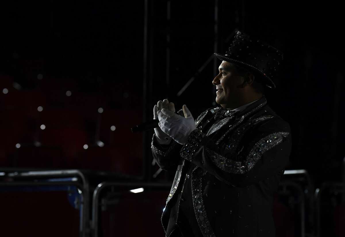 Ringmaster Juan Pablo applauds after a performer's act during the Sunday matinee show of Do Portugal Circus at Parkdale Mall. The international circus is in its final week. Showtimes are 7:30 daily through Friday, Saturday at 5 and 8 p.m. and Sunday at 2, 5 and 8 p.m. Photo made Sunday, April 18, 2021 Kim Brent/The Enterprise