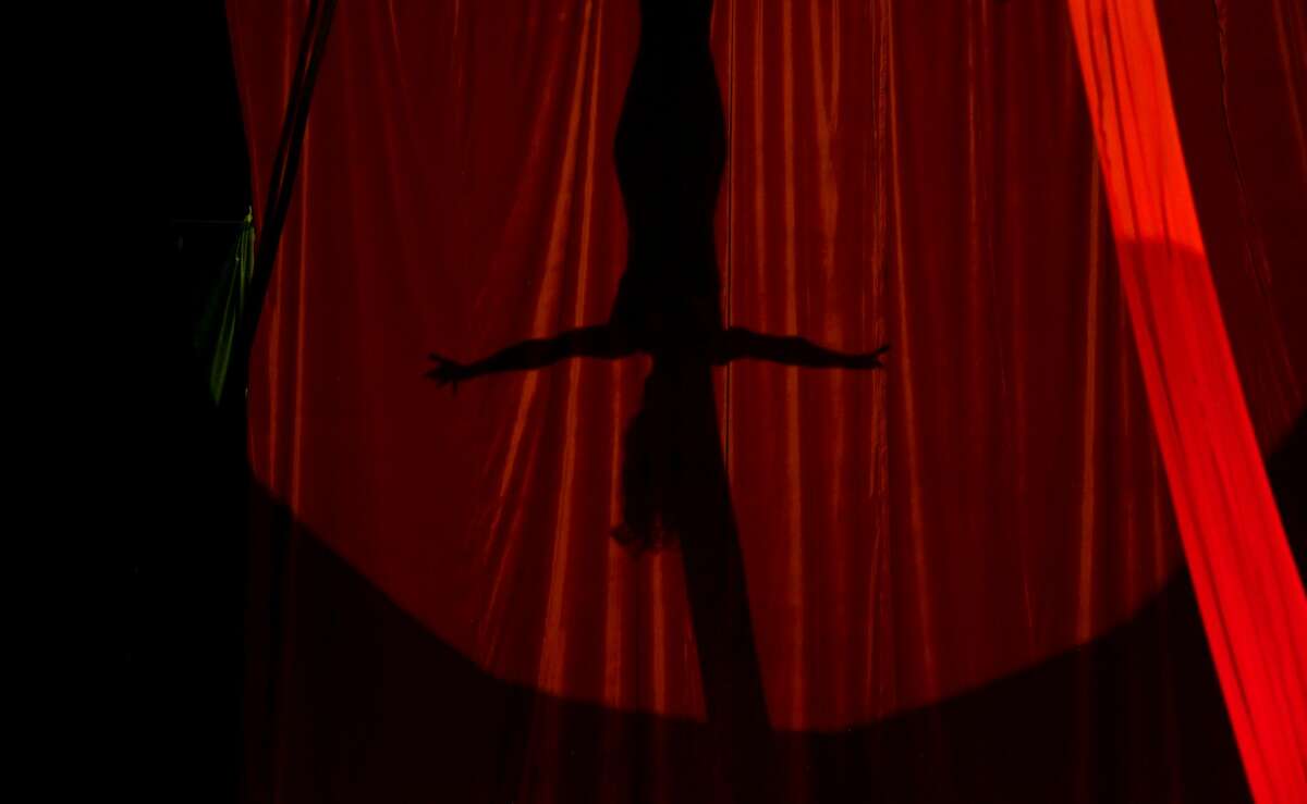 Silks aerialist Susan performs during the Sunday matinee show of Do Portugal Circus at Parkdale Mall. The international circus is in its final week. Showtimes are 7:30 daily through Friday, Saturday at 5 and 8 p.m. and Sunday at 2, 5 and 8 p.m. Photo made Sunday, April 18, 2021 Kim Brent/The Enterprise
