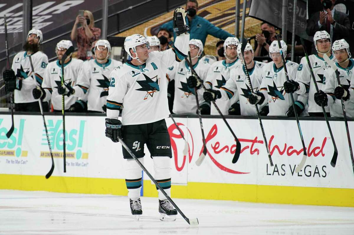 San Jose Sharks center Patrick Marleau (12) motions during a ceremony to mark his passing Gordie Howe for most NHL games played in the first period of an NHL hockey game Monday, April 19, 2021, in Las Vegas. (AP Photo/John Locher)