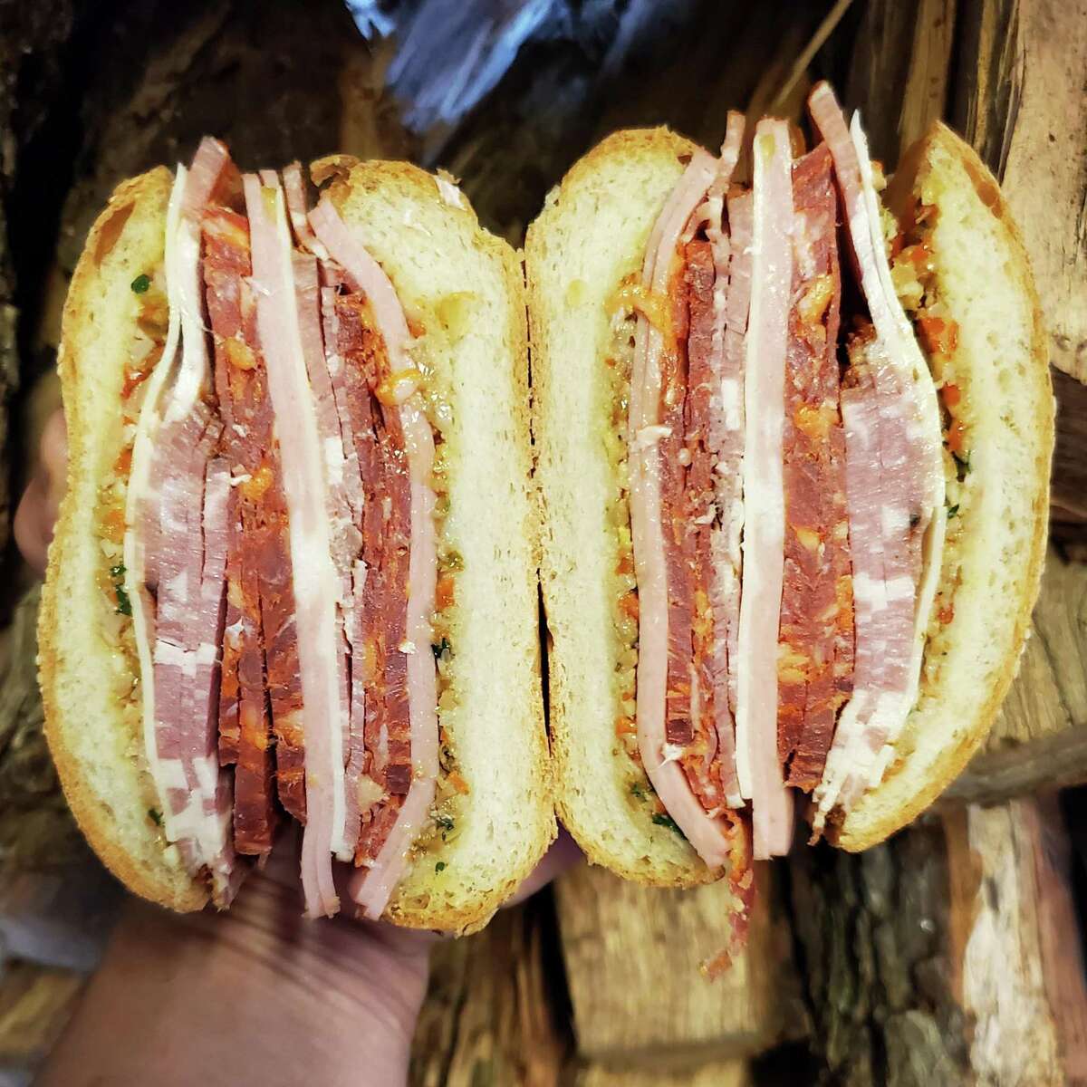 Blood Bros. BBQ has created a new muffuletta sandwich made with house-made smoked capicola, mortadella, soppressata, provolone and olive spread. It will come on the menu as an occasional special.