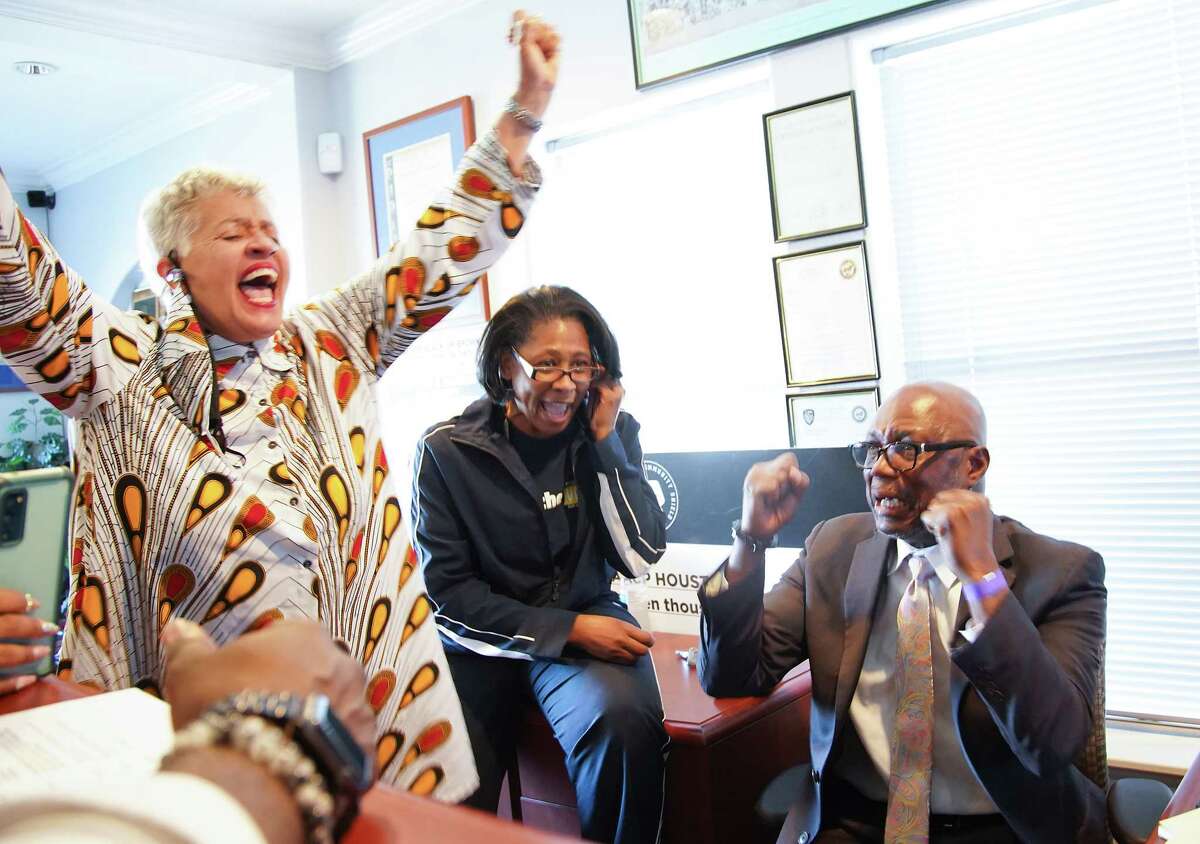 Houston City Council member Carolyn Evans-Shabazz, from left, NAACP Executive Director Yolanda Smith and NCAA President Bishop James Dixon react to the Derek Chauvin verdict at the Houston NAACP headquarters on Tuesday, April 20, 2021.