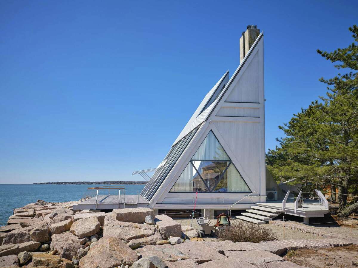 From a distance on the water, the Triangle House looks like a sailboat.
