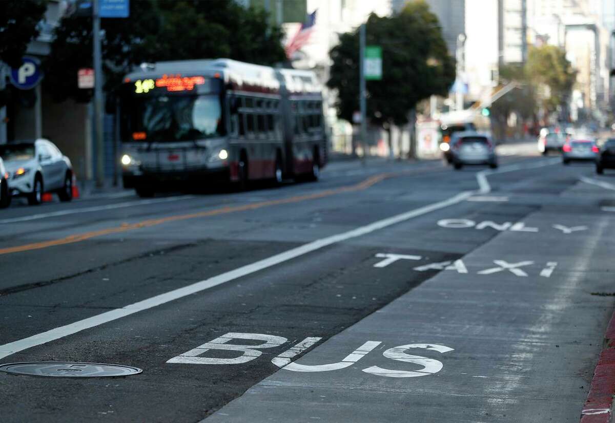 Muni says its emergency transit-only lanes like this one along Mission Street have improved bus travel times. Now the agency will implement high-occupancy-vehicle lanes along two key stretches in San Francisco.