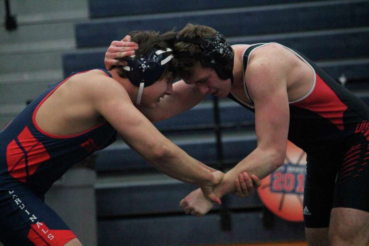 Eli Johnson (right) takes on Big Rapids' Sawyer Meeuwes in recent action. (Pioneer file photo)