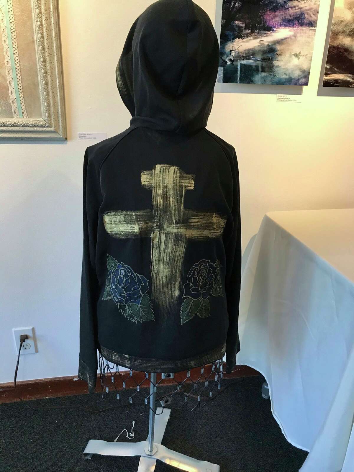 This hand-painted hooded blouse is one of the many items featured in the Spring Fashion Fundraiser at Creative 360. (Photo provided)