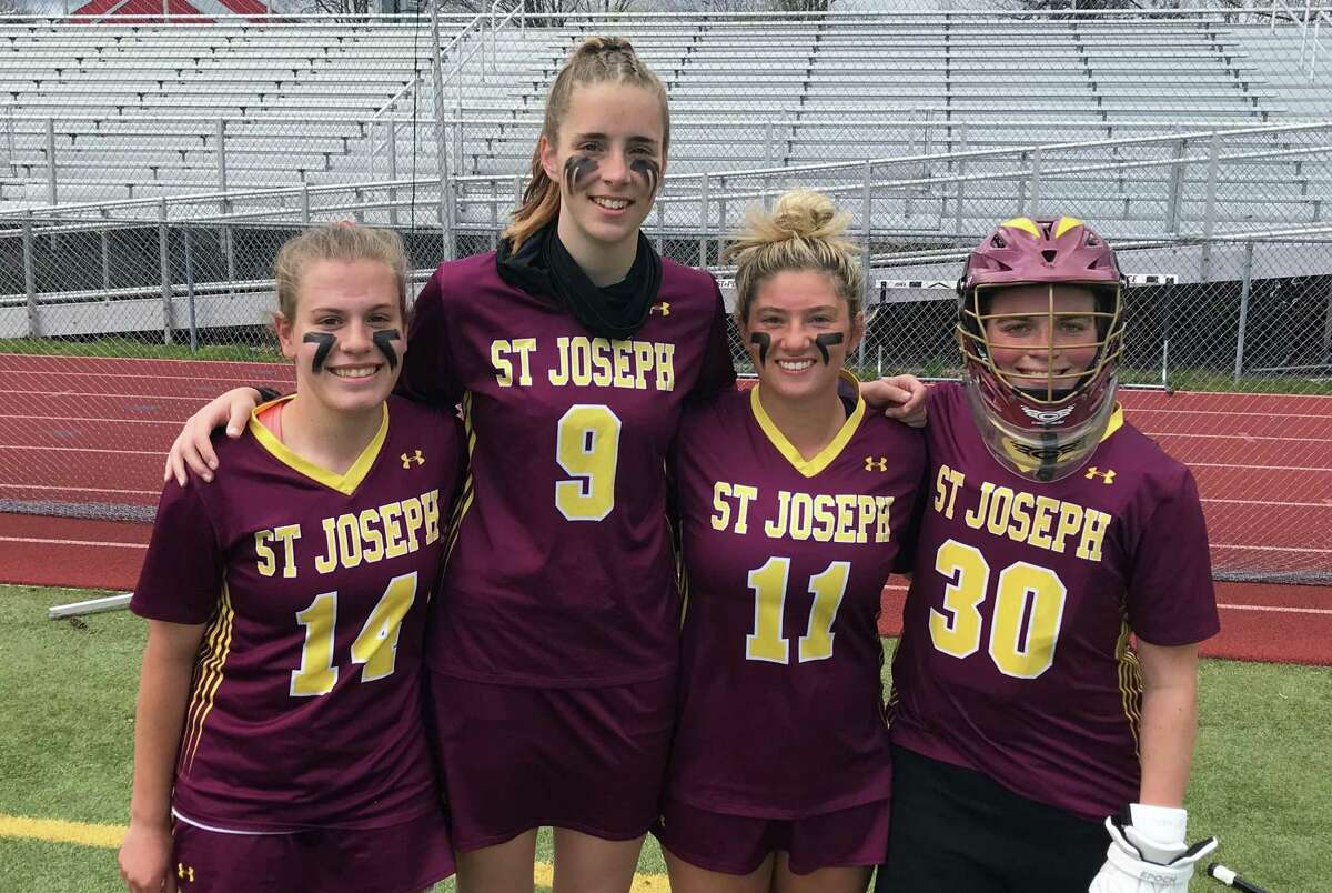 Mia Geignetter, Izzy Casucci, Ryan Camiglio and Samantha Miller are team captains for coach Leeland Gray.