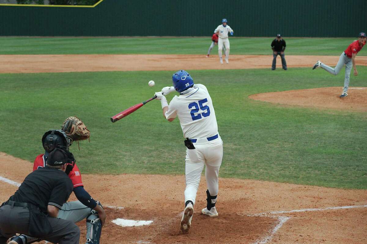 Friendswood’s Boots Landry (25) bats against Manvel at Friendswood High School.