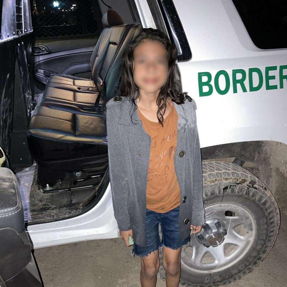 U.S. Border Patrol agents said smugglers abandoned this girl on the riverbanks as they returned to Mexico. An Army soldier rescued her after the soldier saw her struggling to get out of the river due to the swift river current and steep riverbank.
