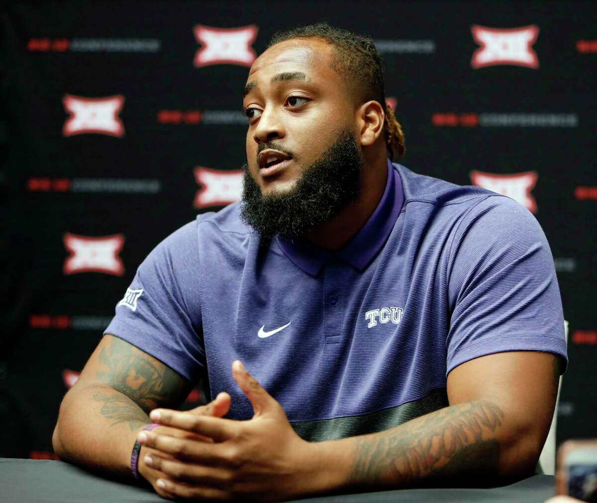 TCU offensive tackle Lucas Niang speaks to the media on the first day of Big 12 NCAA college football media days Monday, July 15, 2019, at AT&T Stadium in Arlington, Texas. (AP Photo/David Kent)