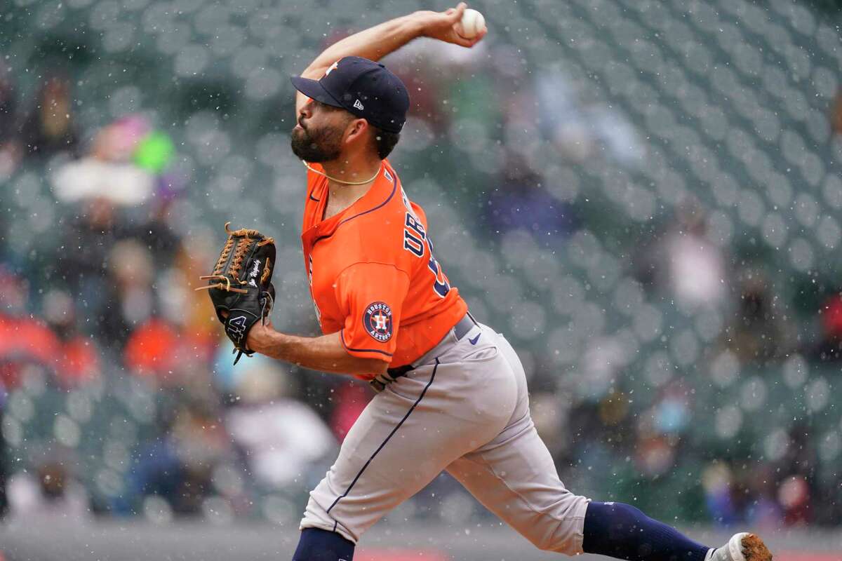 Houston Astros starting pitcher Jose Urquidy works against the Colorado Rockies in the first inning of a baseball game on Wednesday, April 21, 2021, in Denver. (AP Photo/David Zalubowski)