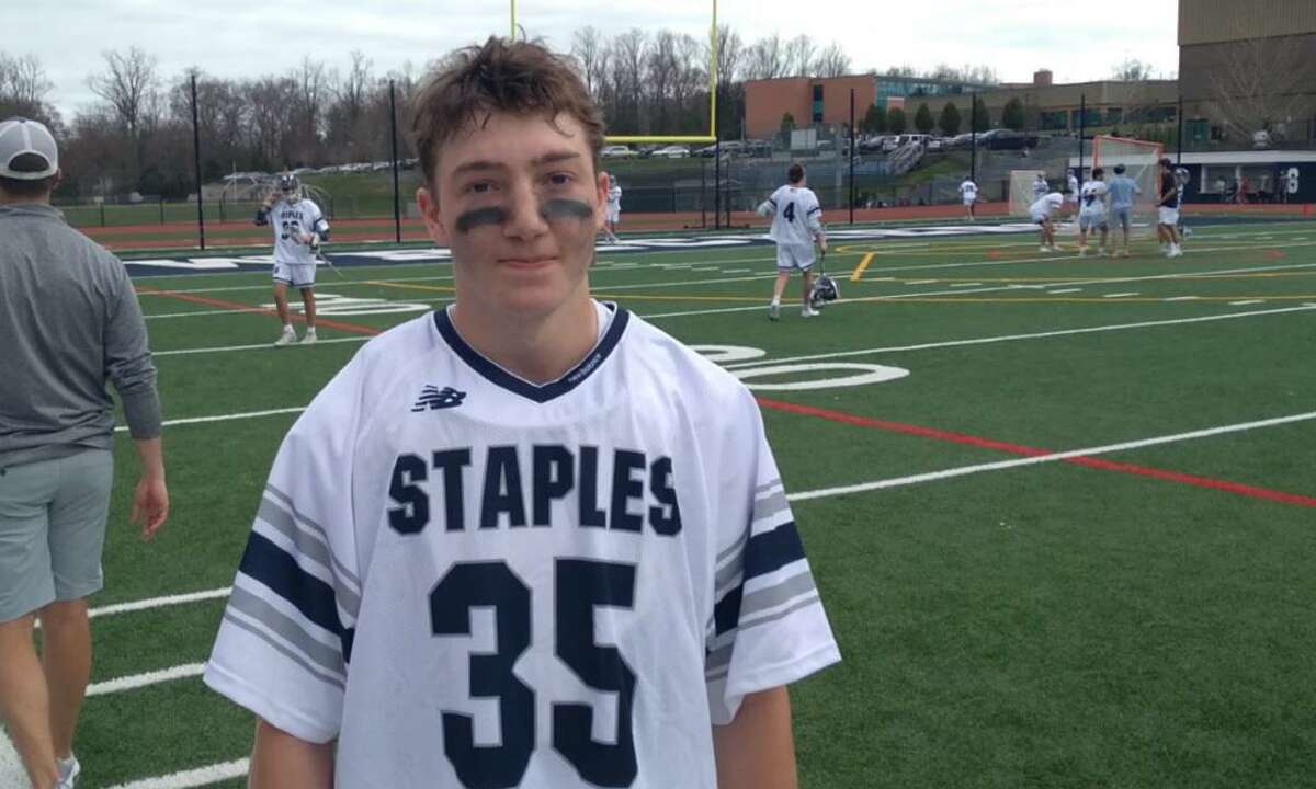 Goalie J.P. Kosakowski helped Staples to a 7-3 boys lacrosse win over New Canaan on April 10, 2021, at Westport, Conn.