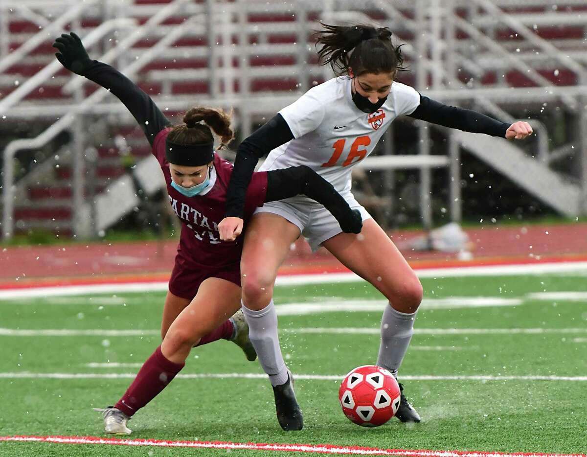 Scotia-Glenville’s Brooklyn Drago, left, battles for the ball with Bethlehem’s Jo Van Royen during a soccer game on Wednesday, April 21, 2021 in Scotia, N.Y. (Lori Van Buren/Times Union)