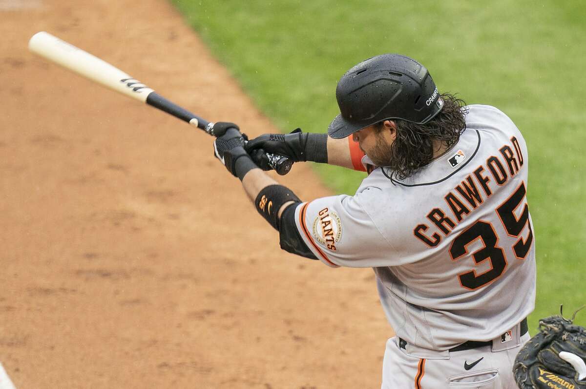 San Francisco Giants' Brandon Crawford in action during the fifth inning of a baseball game against the Philadelphia Phillies, Wednesday, April 21, 2021, in Philadelphia. The Phillies won 6-5. (AP Photo/Chris Szagola)