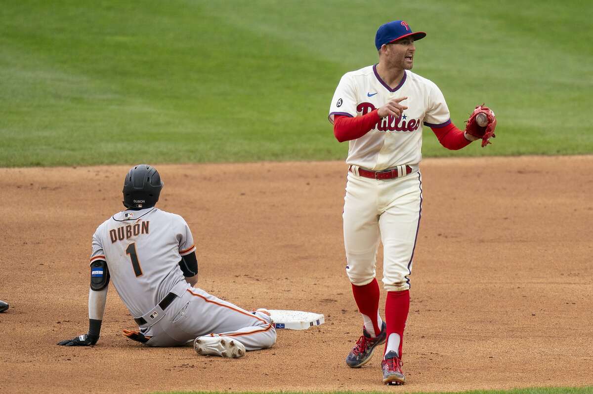 Phillies second baseman Brad Miller reacts to tagging out Mauricio Dubon as he tried to stretch a single into a double.