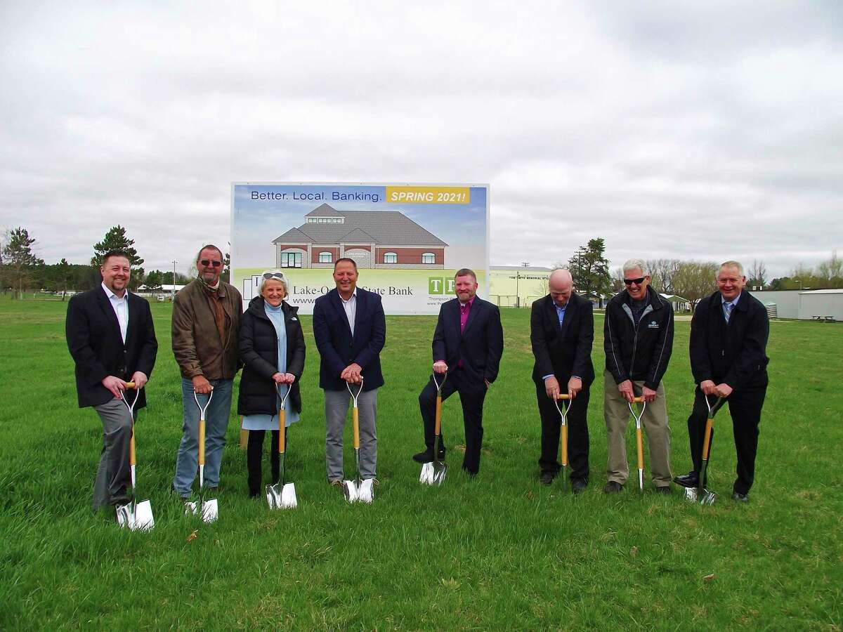 Pictured from the left are Seth Wenger, board member; Larry Bender, board member; Deb Smith-Olson, board chairman; Robert Fisher, President & CEO; Scott Olson, Senior VP & CFO; Terry Wanstead, board member; Terry Gerber, board member; and John Fountain, Thompson Phelan Group. (Courtesy photo)