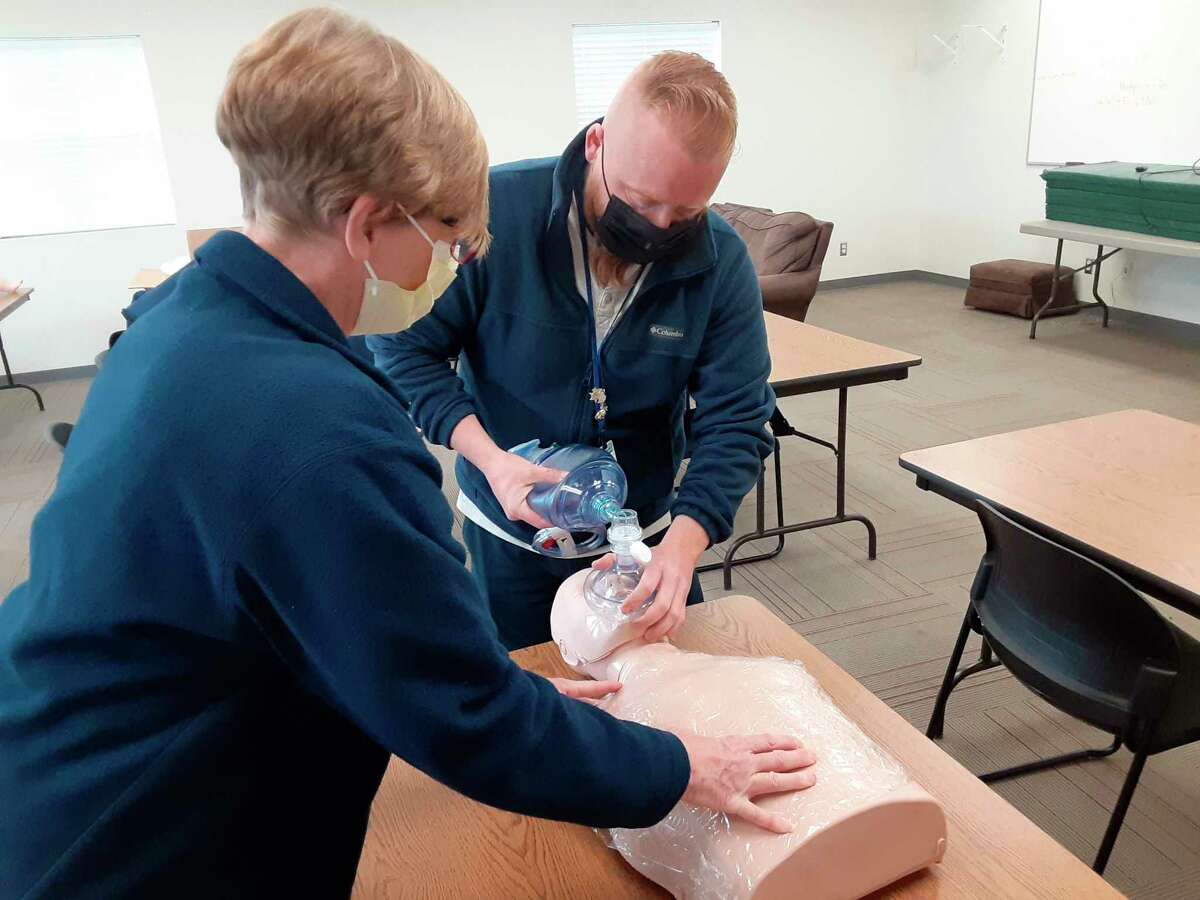 Lake County 911 Dispatch employees conducting Basic Life Support CPR training. (Submitted photo)