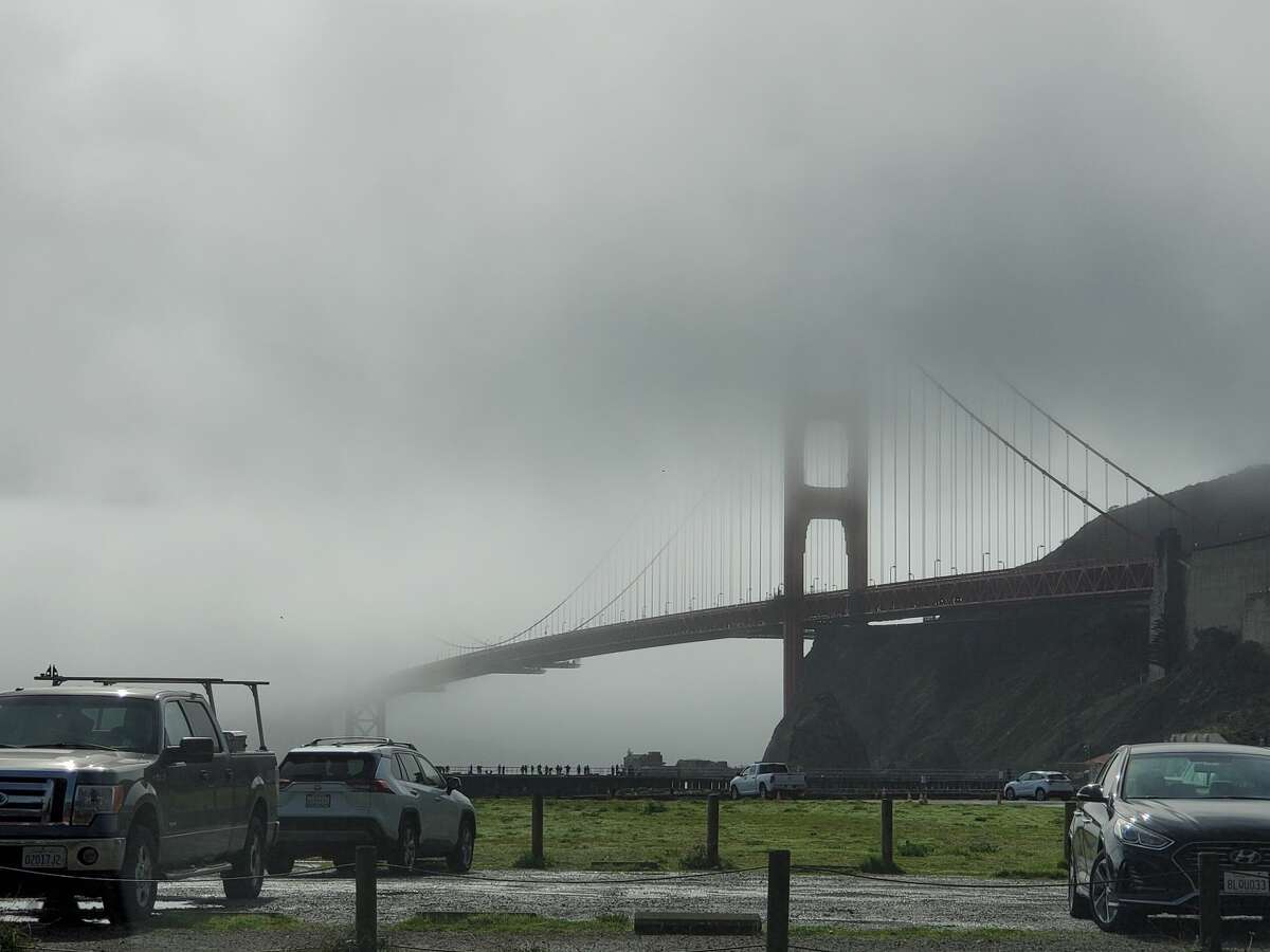 In this file photo, the Golden Gate Bridge is partly obscured by fog.