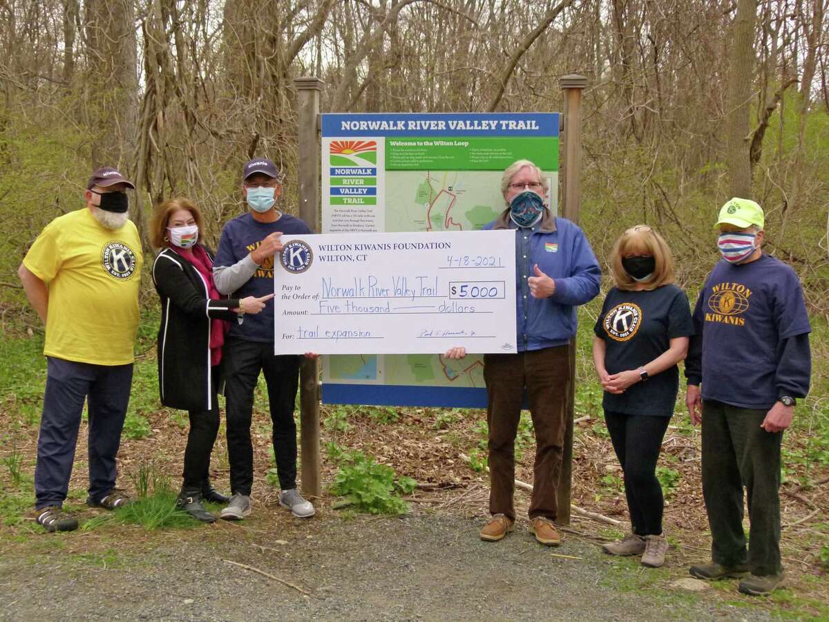 The Wilton Kiwanis Club presented a check for $5,000 for the completion of the Norwalk River Valley Trail in town.